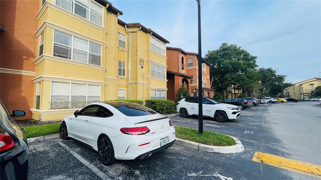 5120 Conroy Road, Unit 13 Orlando, FL 32811 - Photo 21 of 21 a car parked in front of a building