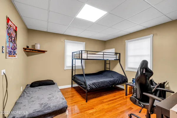 a bedroom with furniture and a bed