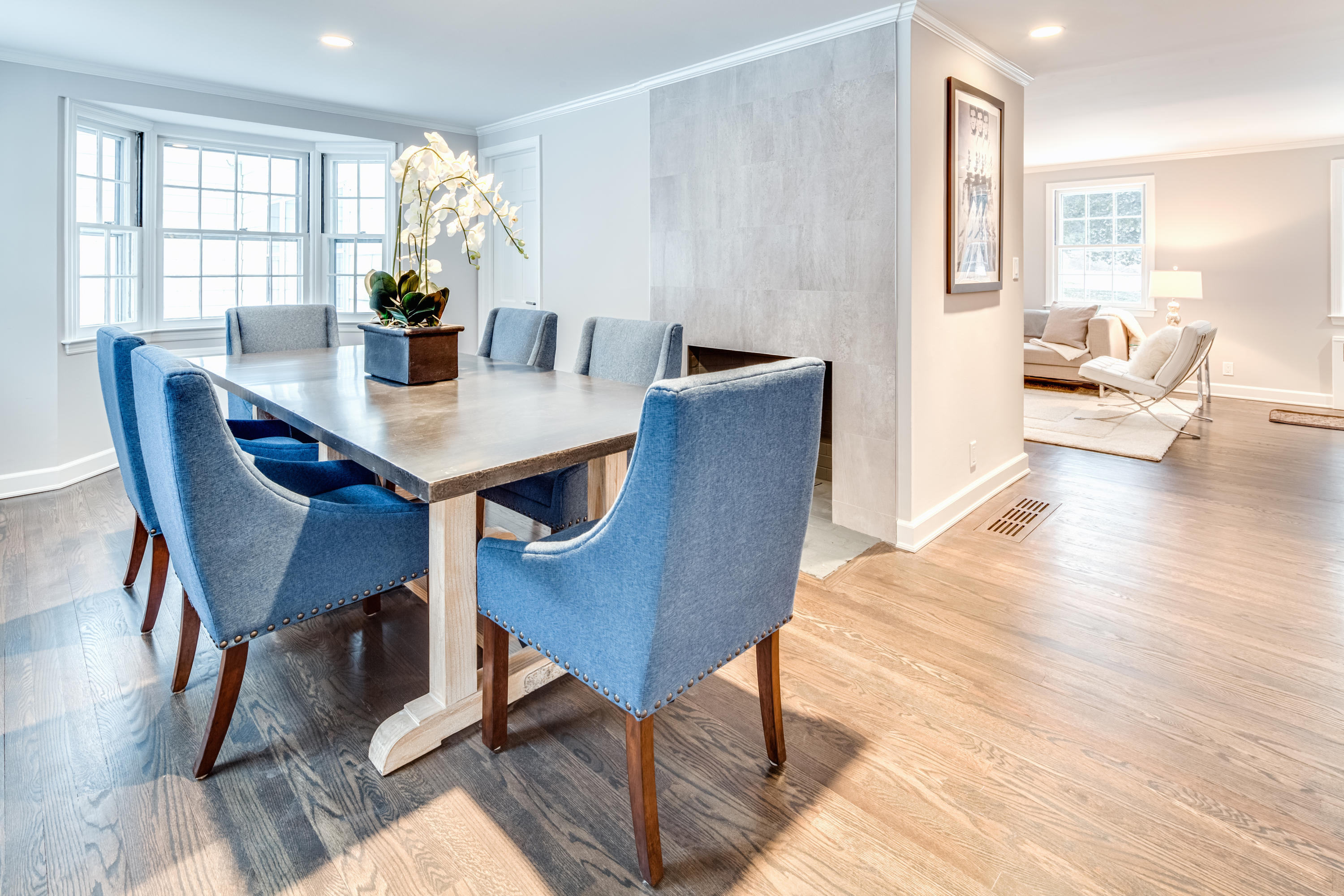 61 Juniper Road New Canaan, CT 06840 - Photo 3 of 17 a view of a dining room with furniture and wooden floor