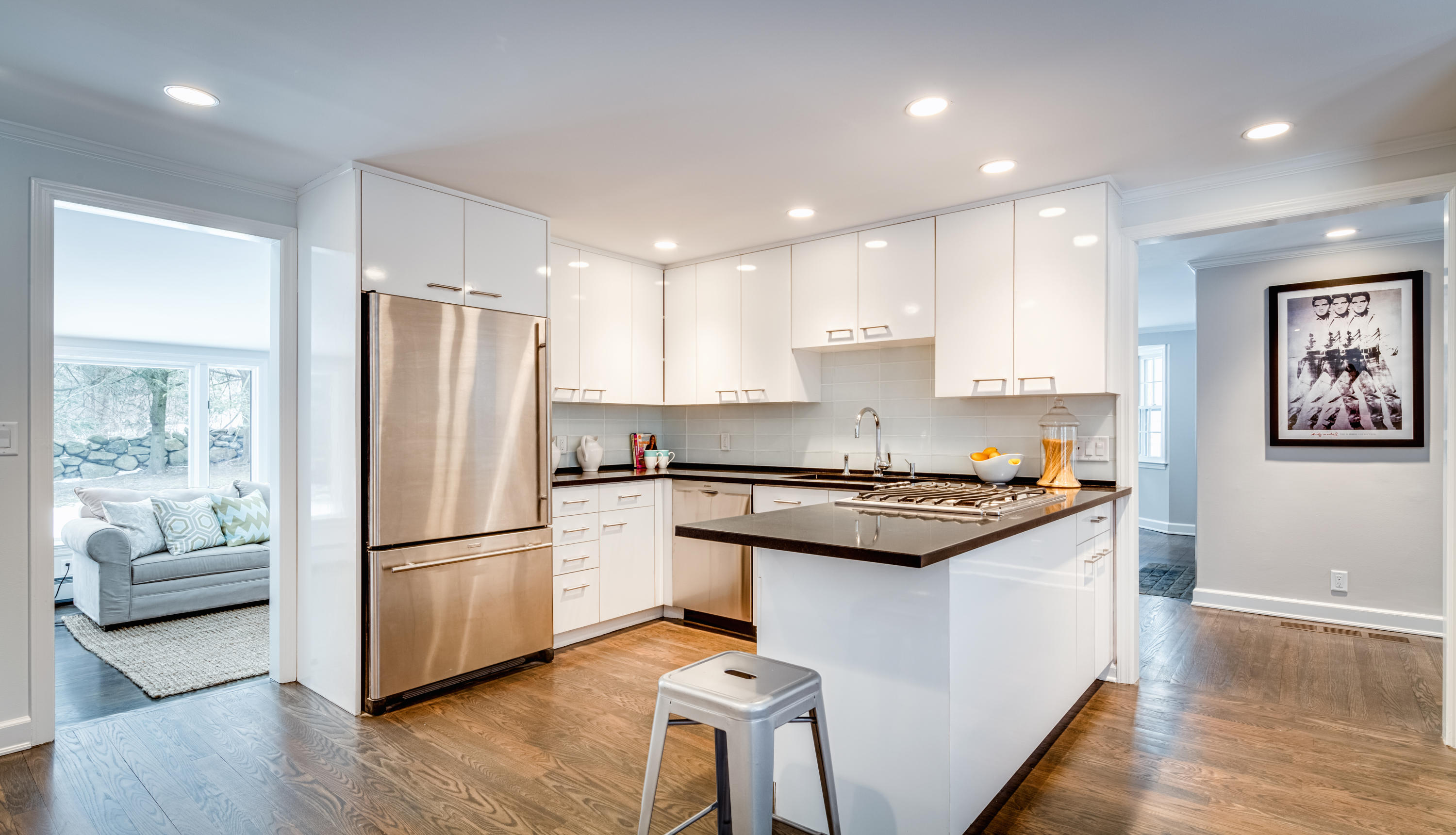 61 Juniper Road New Canaan, CT 06840 - Photo 4 of 17 a kitchen with stainless steel appliances granite countertop a refrigerator a stove a sink dishwasher and a refrigerator with wooden floor