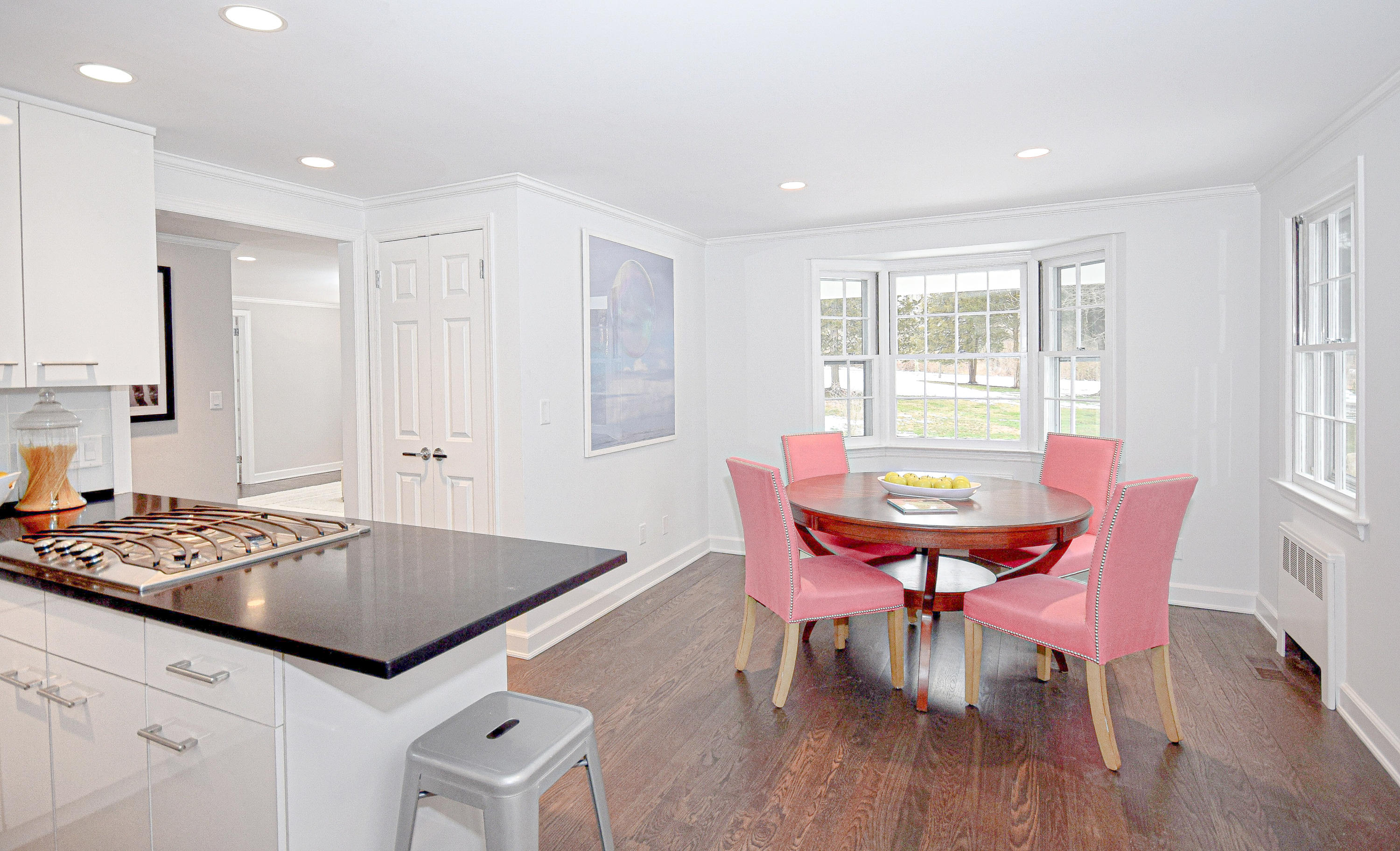 61 Juniper Road New Canaan, CT 06840 - Photo 5 of 17 a view of a dining room with furniture and wooden floor