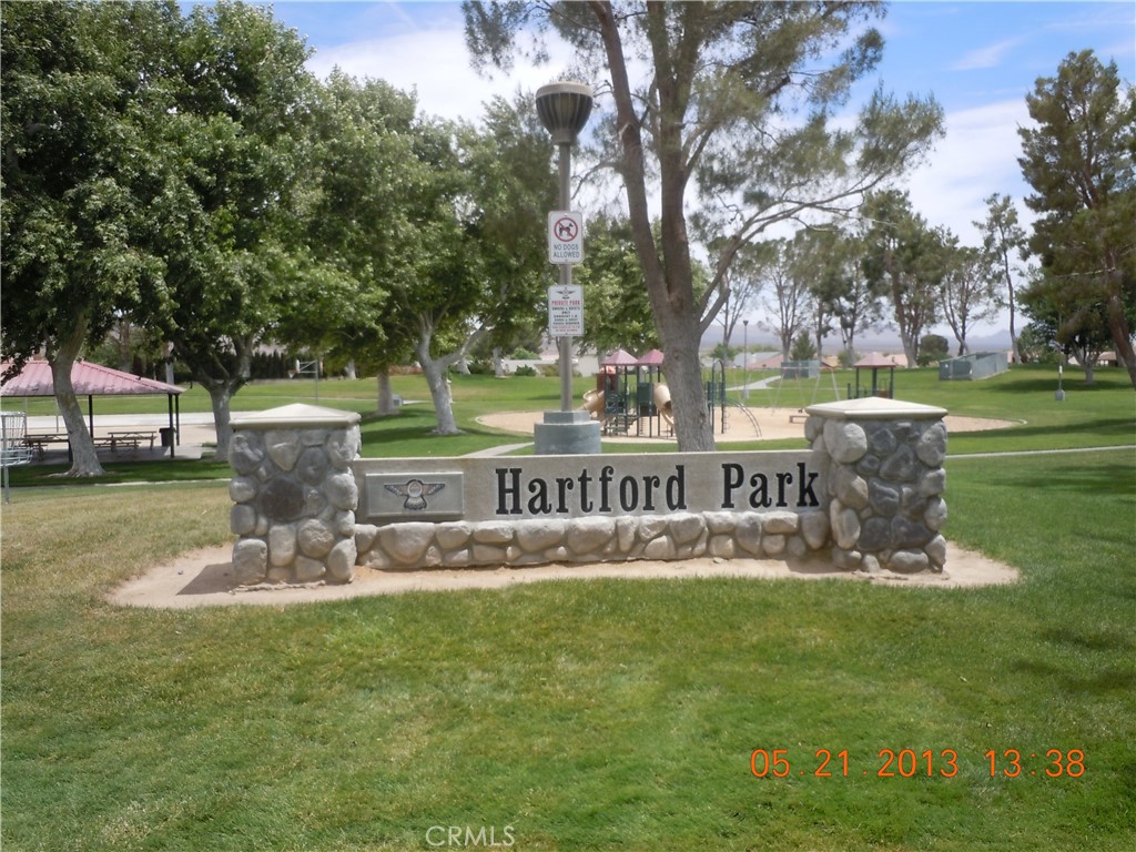 26701 Bluewater Road Helendale, CA 92342 - Photo 19 of 22 a view of a park with bench and trees