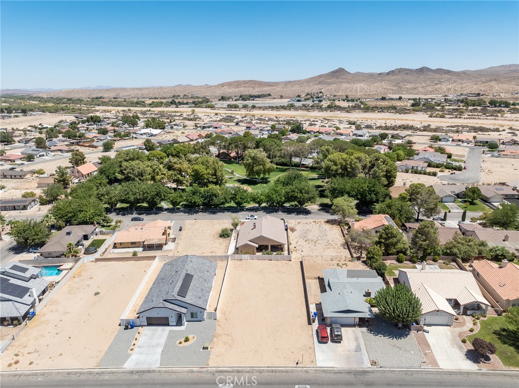 26701 Bluewater Road Helendale, CA 92342 - Photo 5 of 22 an aerial view of residential houses with outdoor space