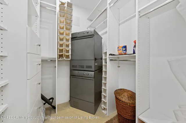 a storage room with washer and dryer