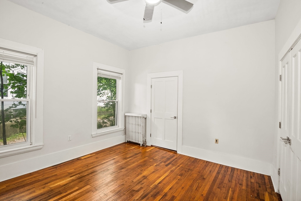 35 Oak Avenue, Unit 1 Worcester, MA 01605 - Photo 14 of 25 wooden floor in an empty room