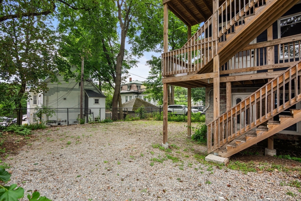 35 Oak Avenue, Unit 1 Worcester, MA 01605 - Photo 21 of 25 a view of a house with a yard and deck area