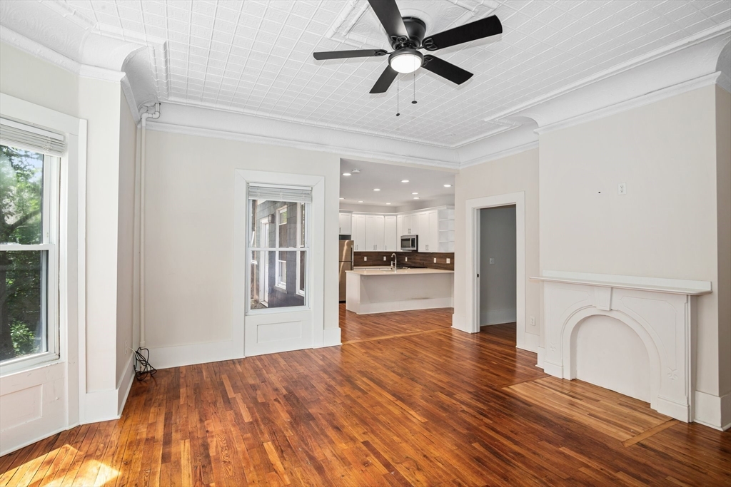 35 Oak Avenue, Unit 1 Worcester, MA 01605 - Photo 3 of 25 a view of a kitchen with wooden floor and a kitchen