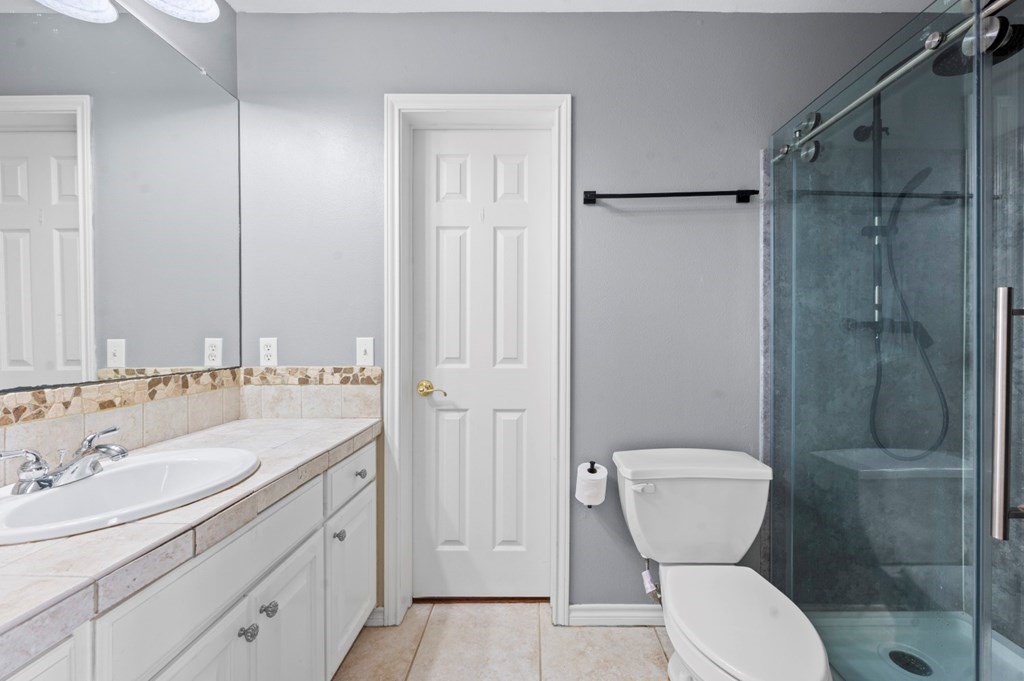 365 Copperfield Loop Lufkin, TX 75904 - Photo 19 of 28 a bathroom with a sink toilet and shower