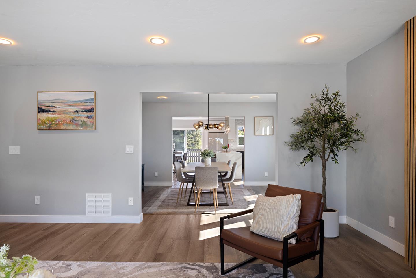 488 Monterey Road Pacifica, CA 94044 - Photo 18 of 78 a living room with furniture and a potted plant