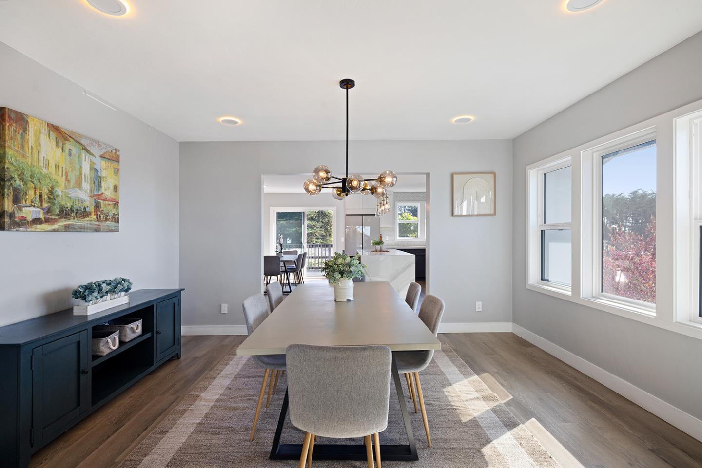 488 Monterey Road Pacifica, CA 94044 - Photo 19 of 78 a view of a dining room with furniture window and wooden floor