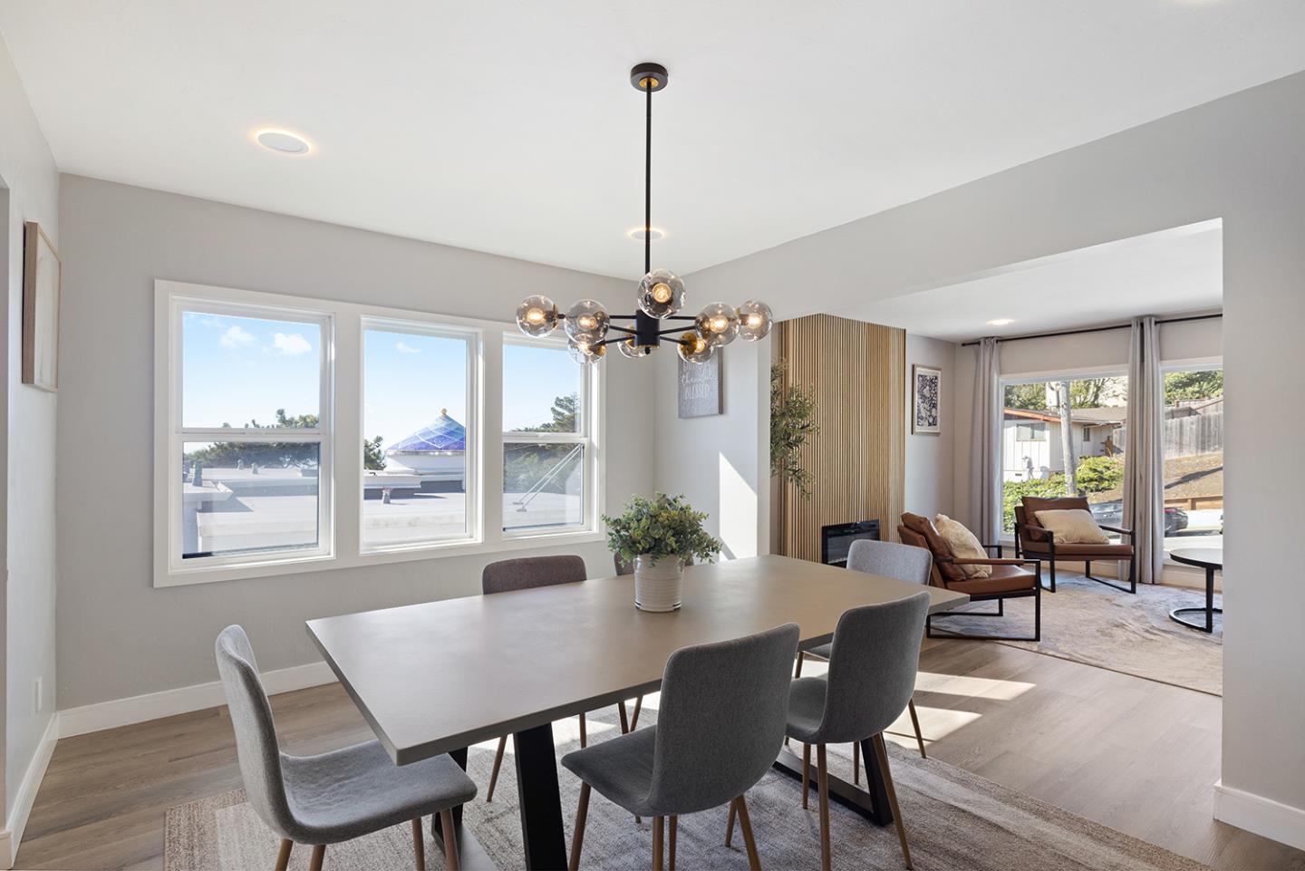 488 Monterey Road Pacifica, CA 94044 - Photo 20 of 78 a view of a dining room with furniture window and outside view
