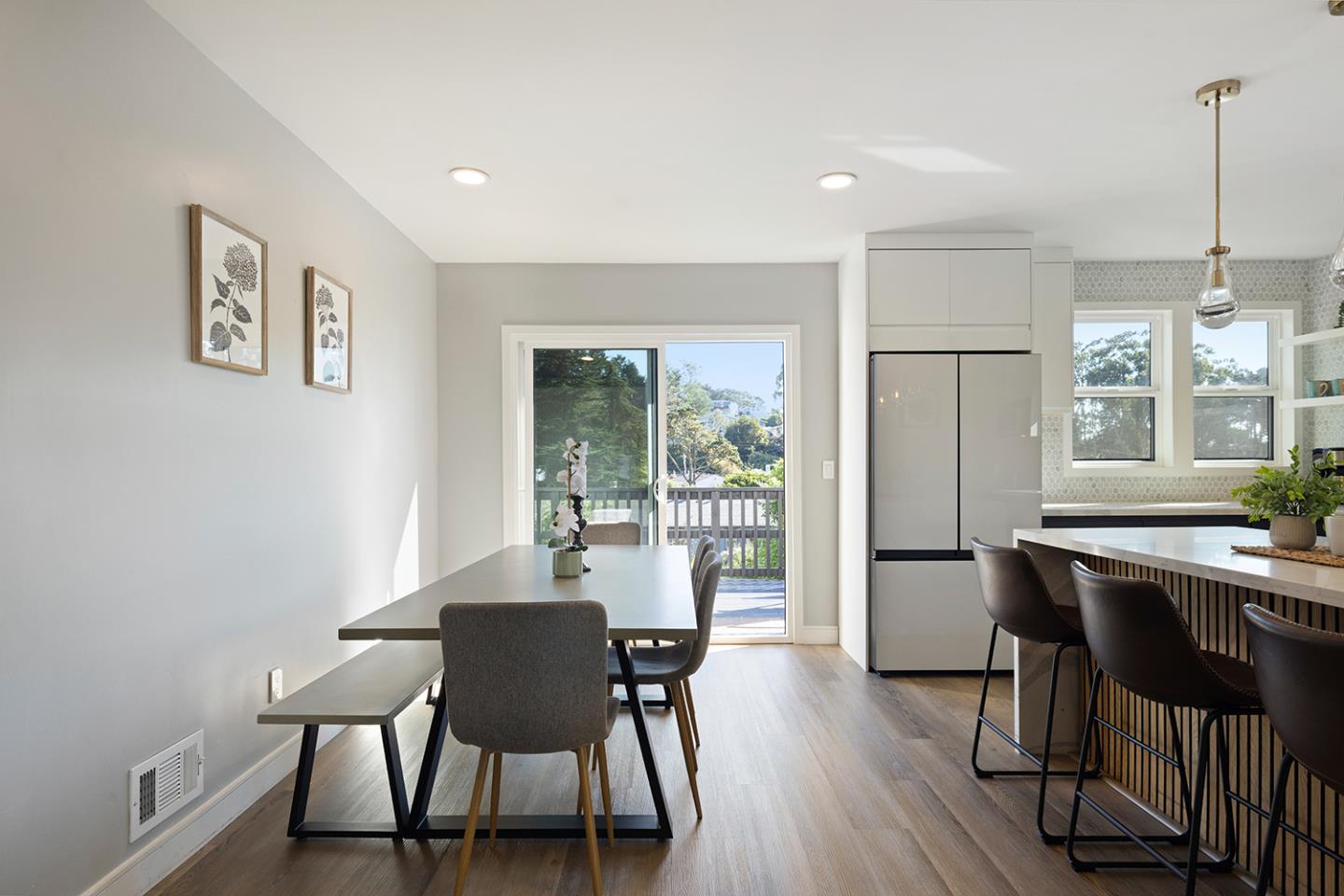 488 Monterey Road Pacifica, CA 94044 - Photo 26 of 78 a view of a dining room with furniture window and wooden floor
