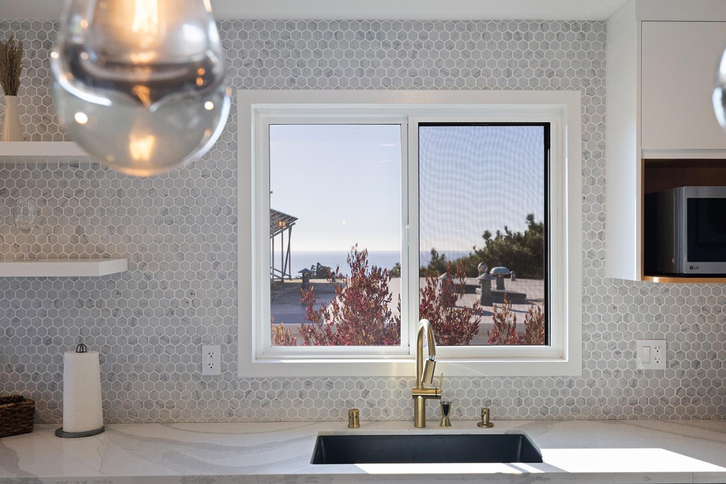 488 Monterey Road Pacifica, CA 94044 - Photo 31 of 78 a bathroom with a sink and a mirror