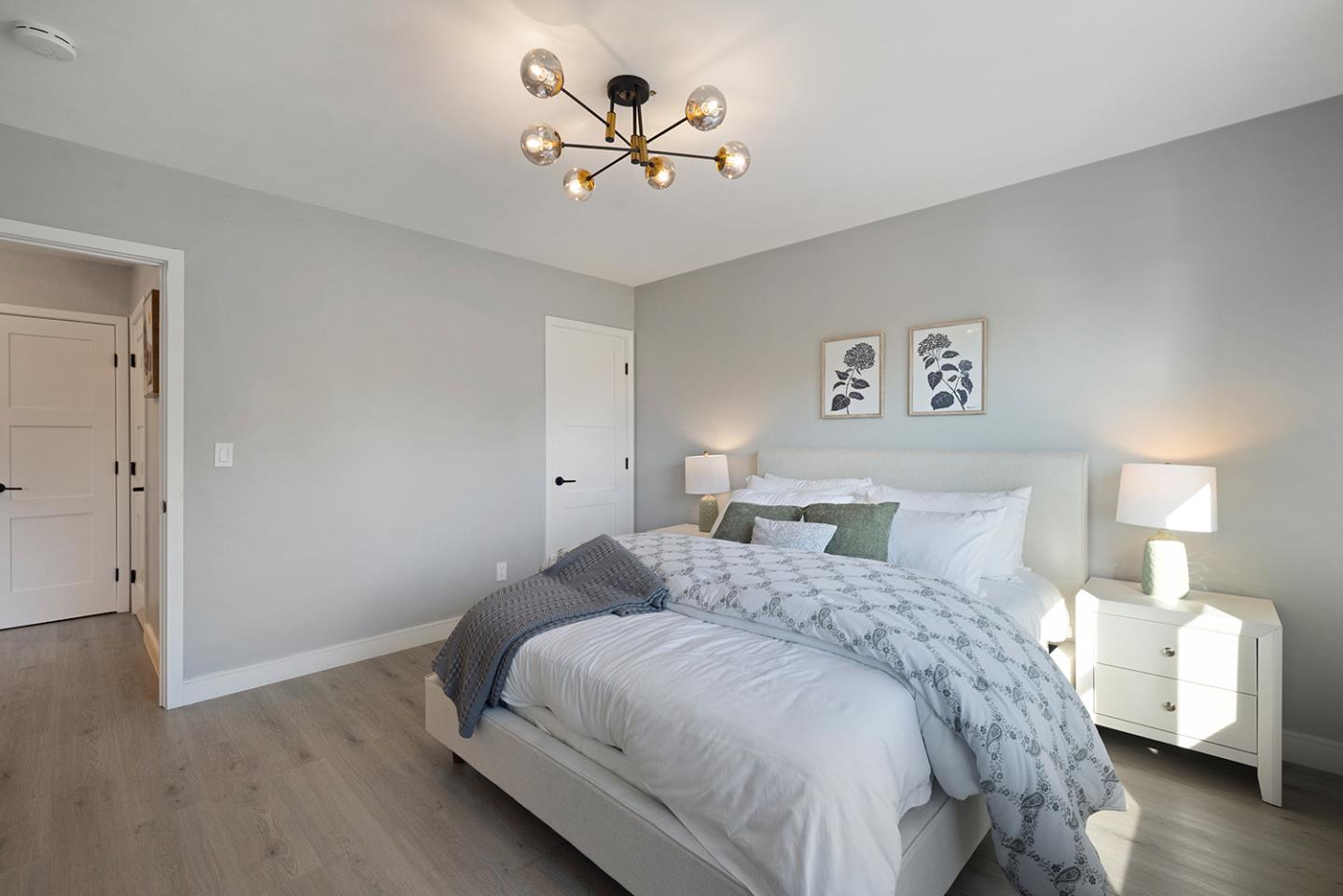 488 Monterey Road Pacifica, CA 94044 - Photo 46 of 78 a bedroom with a bed and a painting on the wall