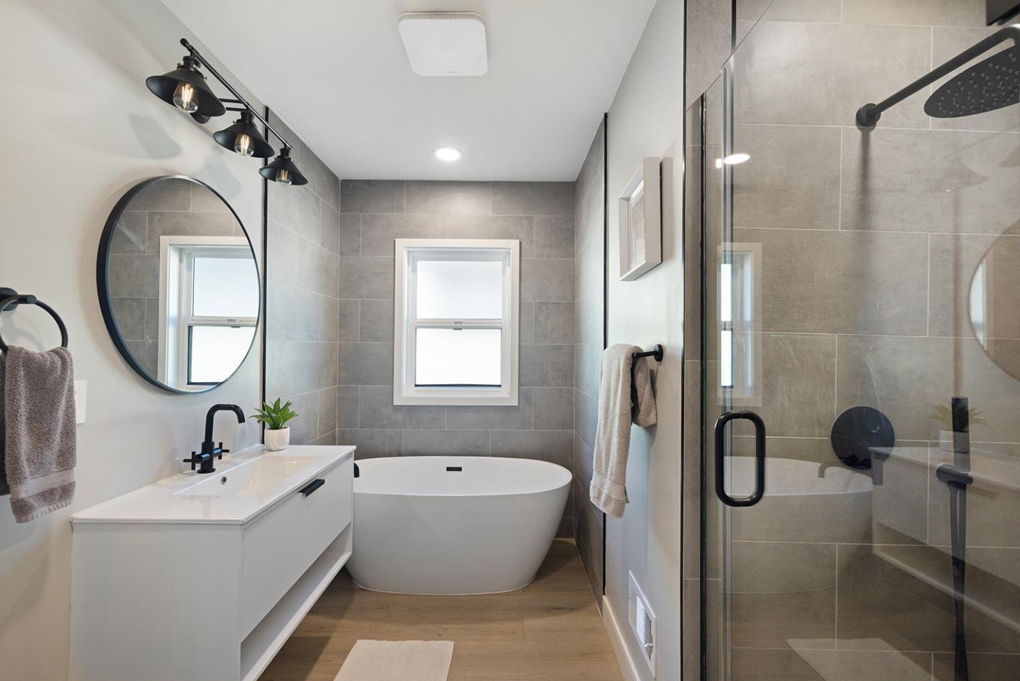 488 Monterey Road Pacifica, CA 94044 - Photo 47 of 78 a bathroom with a tub sink toilet and a mirror