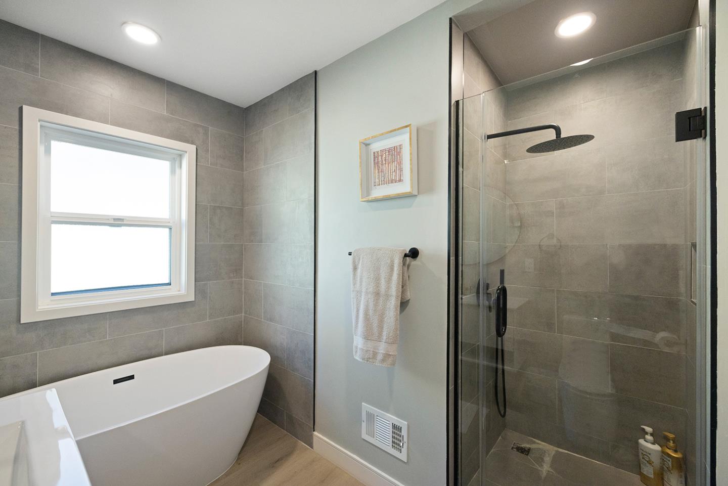 488 Monterey Road Pacifica, CA 94044 - Photo 48 of 78 a bathroom with a white bath tub a shower and a sink