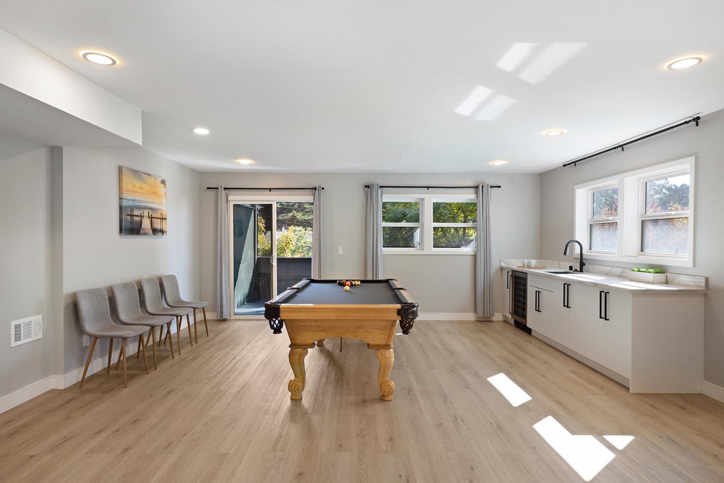 488 Monterey Road Pacifica, CA 94044 - Photo 54 of 78 a living room with furniture and a wooden floor