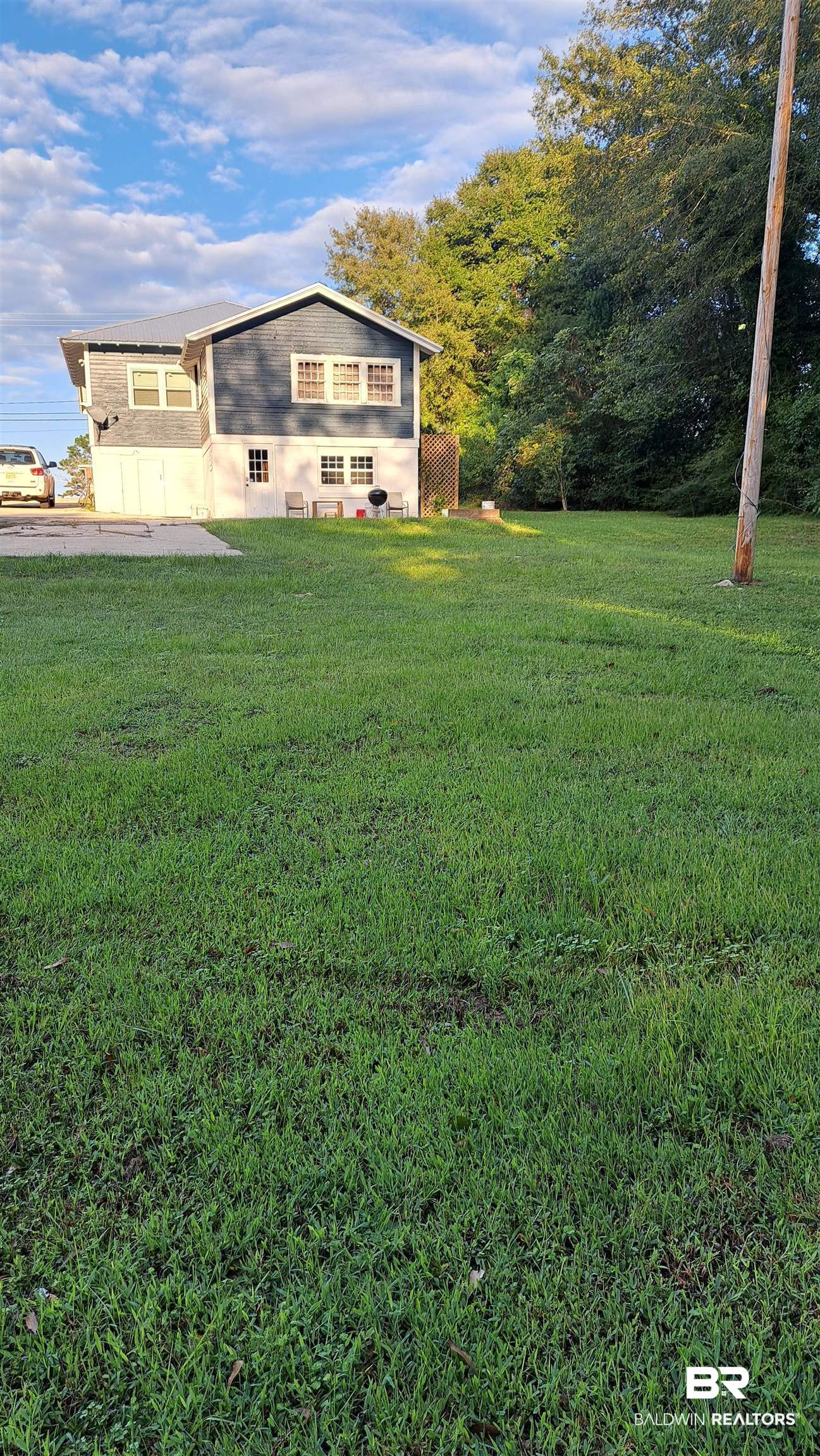 110 South Main Street Evergreen, AL 36401 - Photo 23 of 27 Expansive green lawn providing ample outdoor space