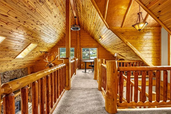 a view of a pathway of a wooden deck