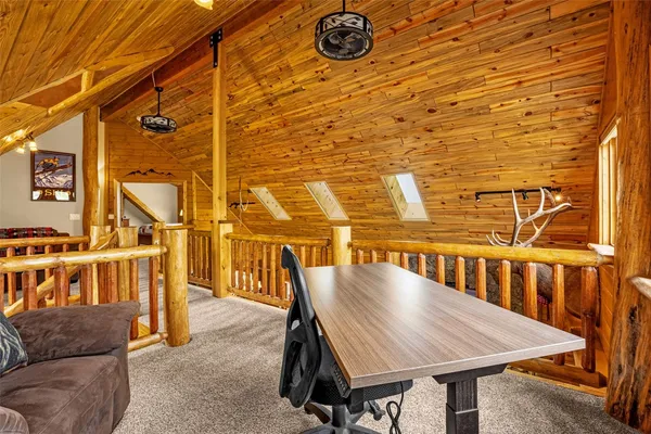 a view of balcony with furniture