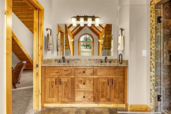 a view of a entryway door with hallway