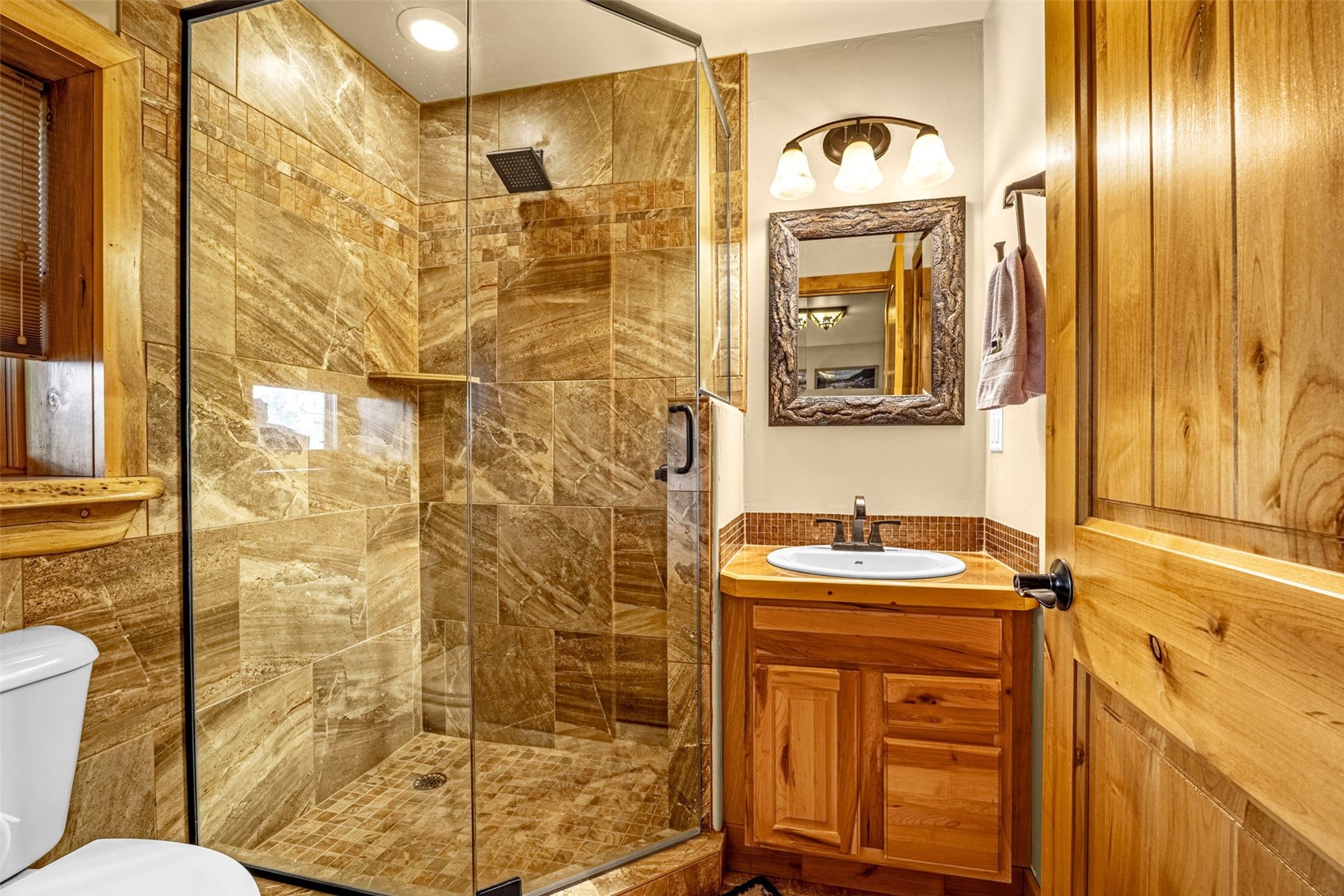 3418 High Creek Road Fairplay, CO 80440 - Photo 33 of 42 a bathroom with a sink a toilet and shower