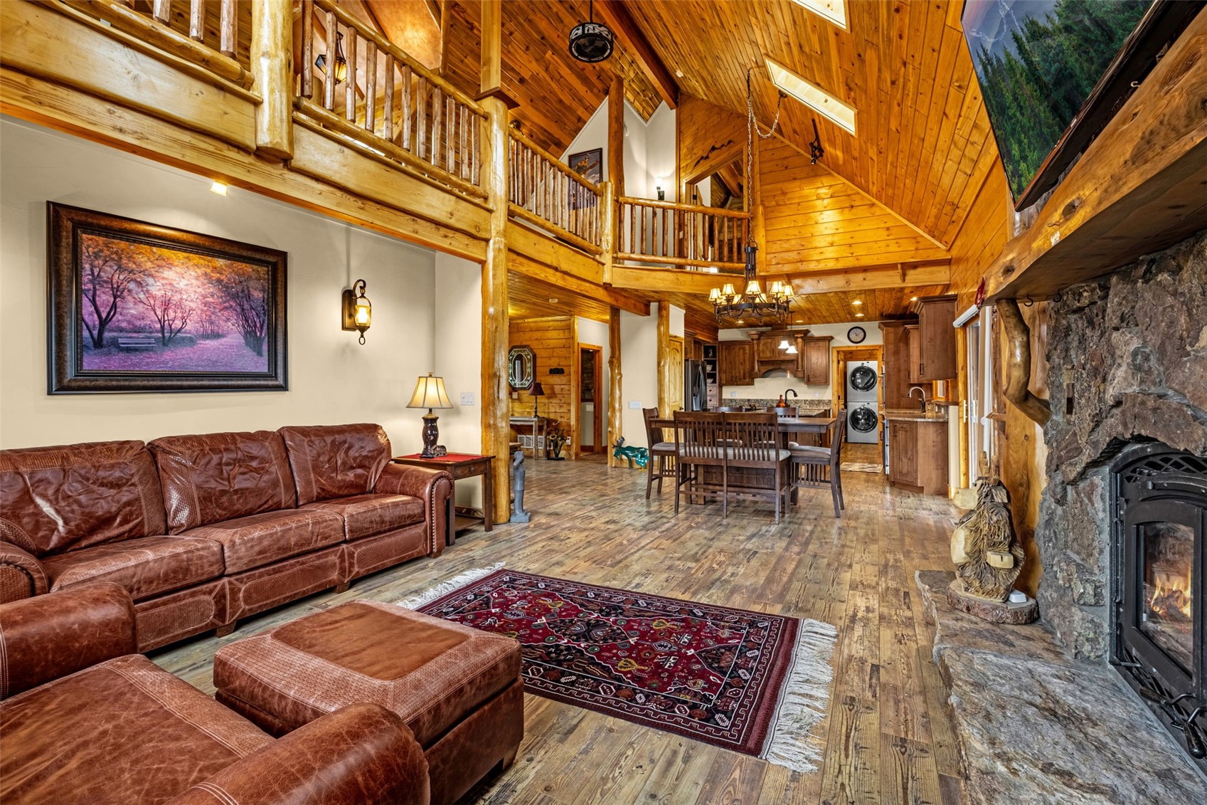 3418 High Creek Road Fairplay, CO 80440 - Photo 6 of 42 a living room with furniture and a fireplace
