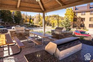 223 Hunter Road, Unit B303 Brian Head, UT 84719 - Photo 37 of 49 View of patio featuring an outdoor kitchen
