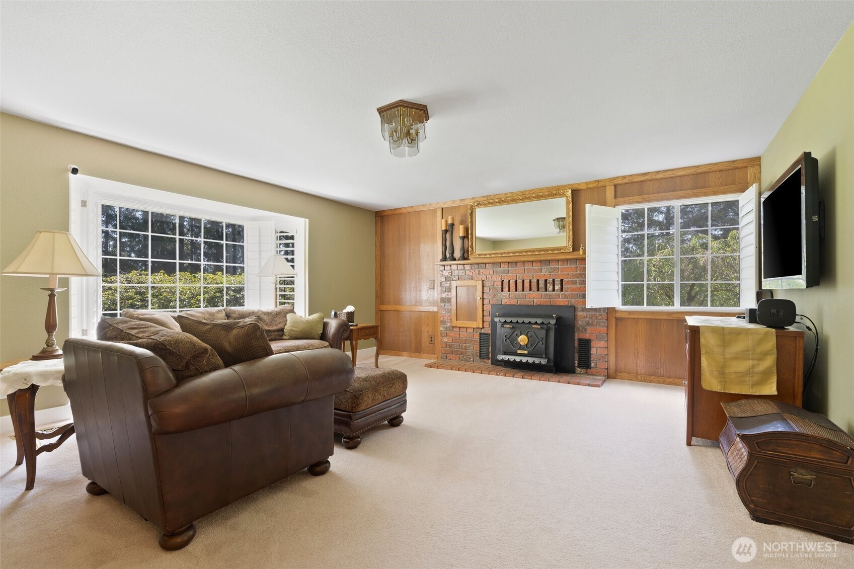629 Brockway Road Chehalis, WA 98532 - Photo 14 of 40 a living room with furniture window and a fireplace