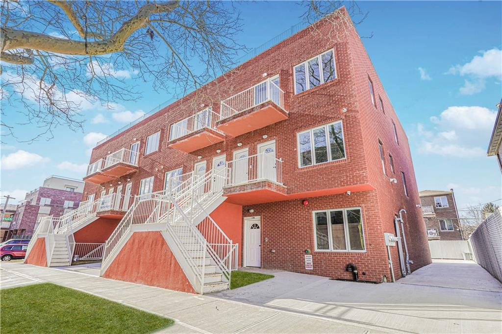 158 Bay 29th Street Brooklyn, NY 11214 - Photo 2 of 24 a view of a building with a yard