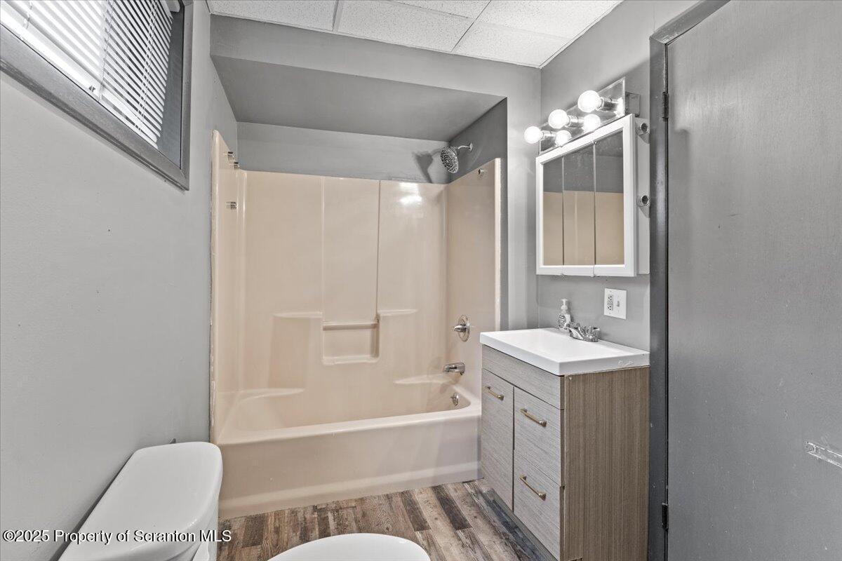 901 Eynon Street Scranton, PA 18504 - Photo 12 of 34 a bathroom with a tub sink and mirror