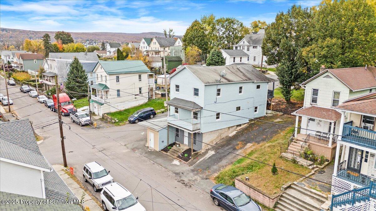 901 Eynon Street Scranton, PA 18504 - Photo 2 of 34 an aerial view of a house with a garden