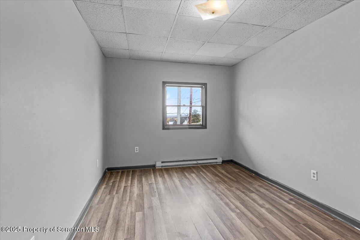 901 Eynon Street Scranton, PA 18504 - Photo 21 of 34 a view of empty room with wooden floor and fan