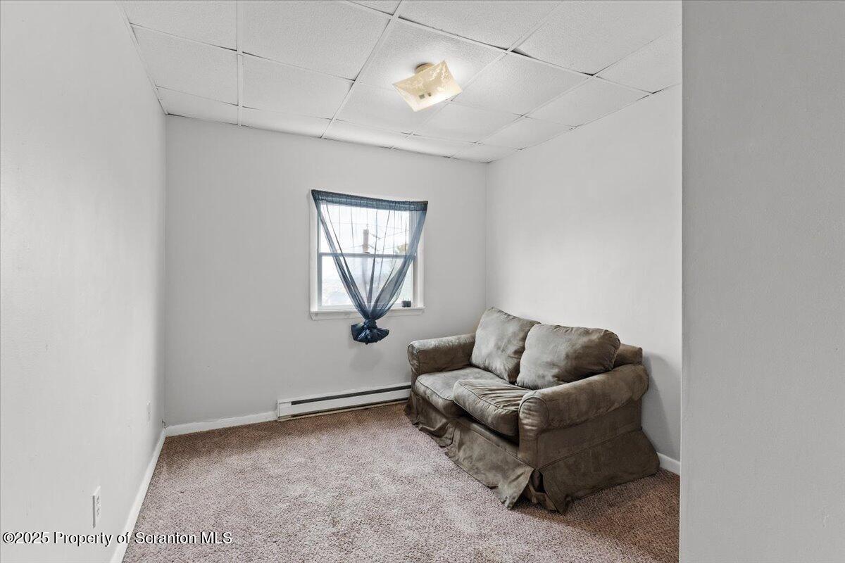 901 Eynon Street Scranton, PA 18504 - Photo 31 of 34 a living room with furniture and a window