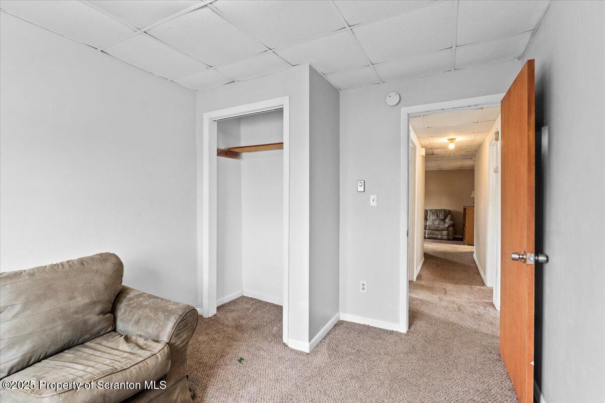 901 Eynon Street Scranton, PA 18504 - Photo 32 of 34 a living room with furniture and a window