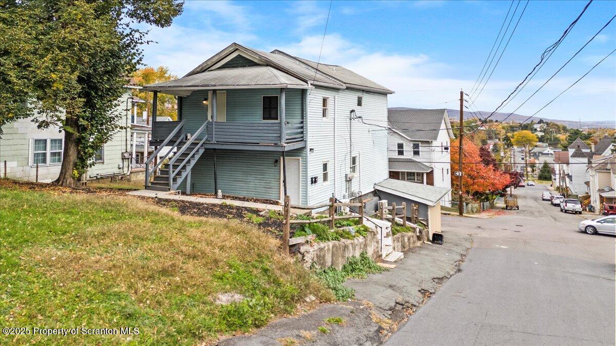 901 Eynon Street Scranton, PA 18504 - Photo 6 of 34 a view of a house with a outdoor space