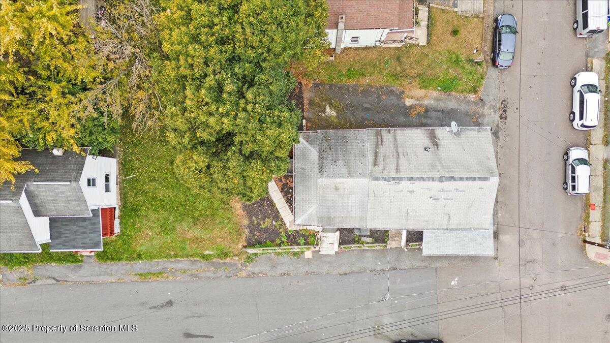 901 Eynon Street Scranton, PA 18504 - Photo 8 of 34 an aerial view of a house with a yard and a garage