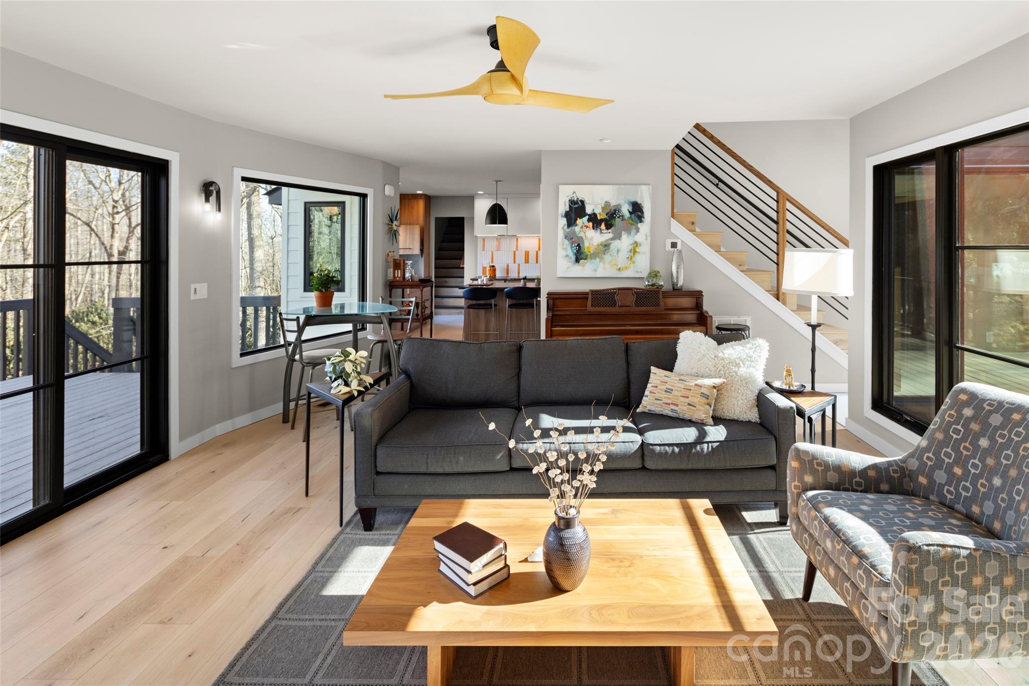 1202 Davis Mountain Road Hendersonville, NC 28739 - Photo 11 of 43 a living room with furniture and a table