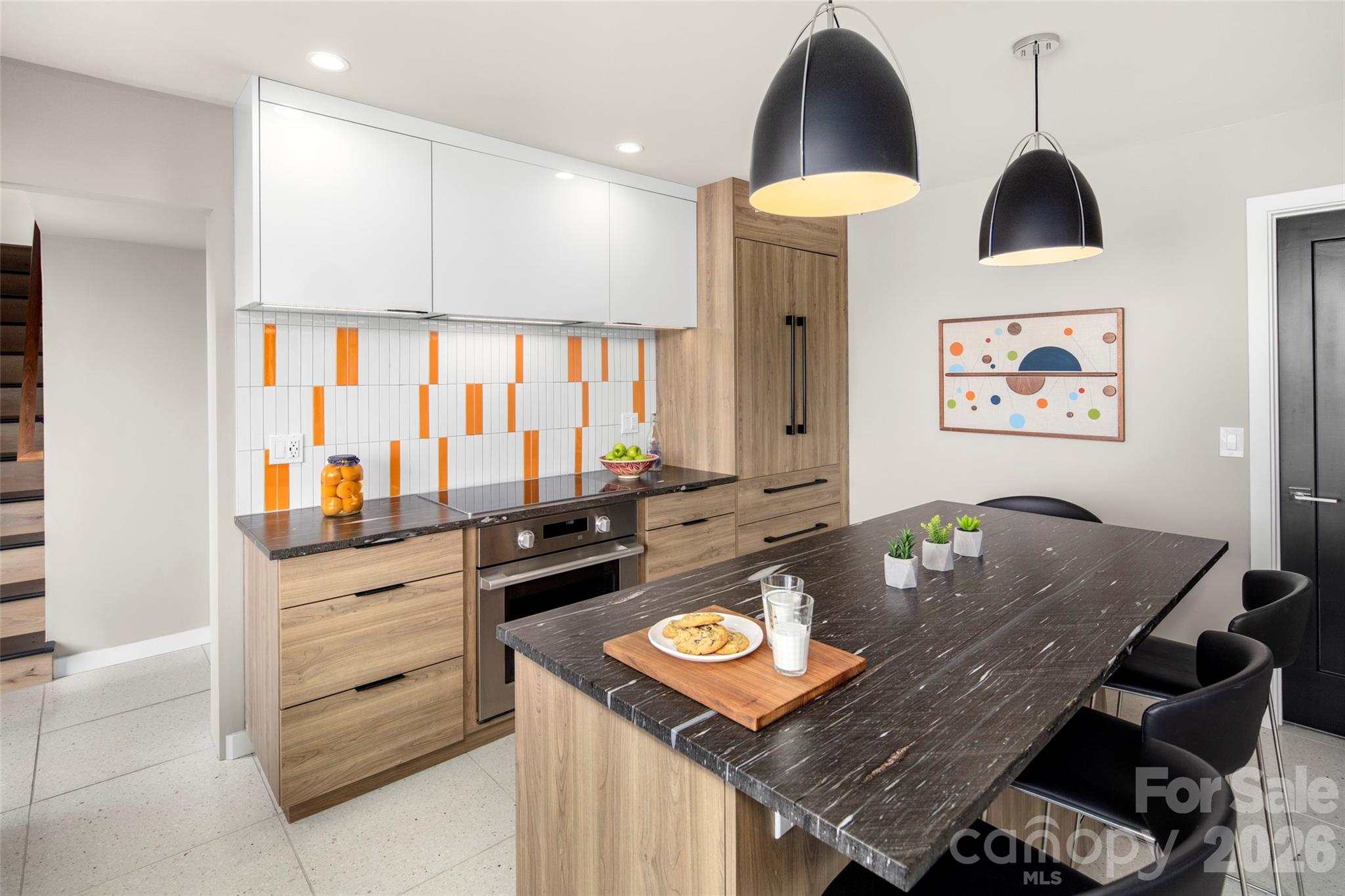 1202 Davis Mountain Road Hendersonville, NC 28739 - Photo 17 of 43 a living room with granite countertop furniture and a flat screen tv