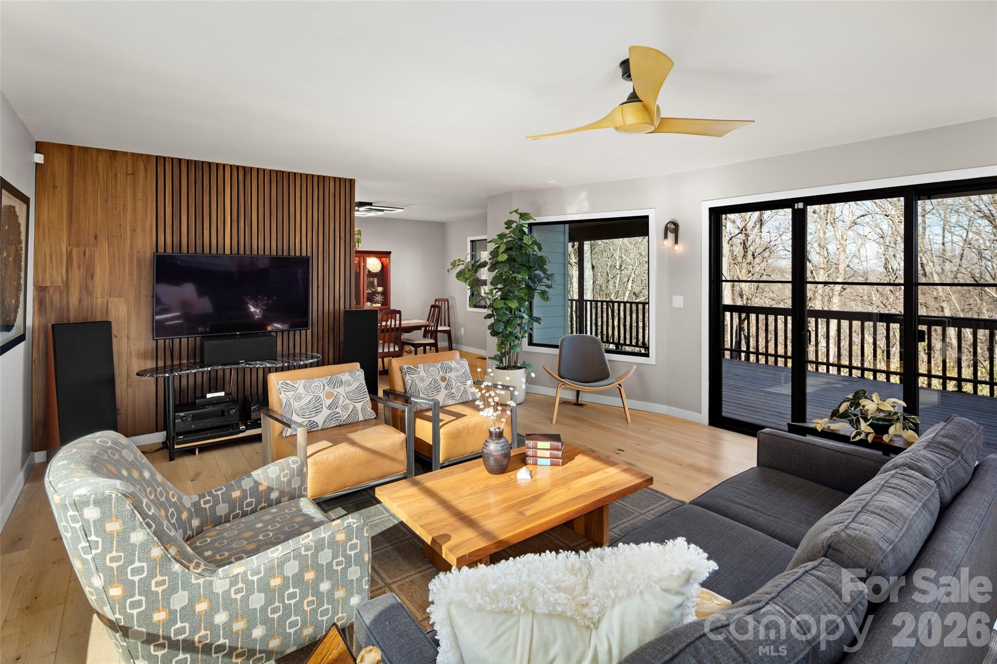 1202 Davis Mountain Road Hendersonville, NC 28739 - Photo 3 of 43 a living room with furniture and a large window