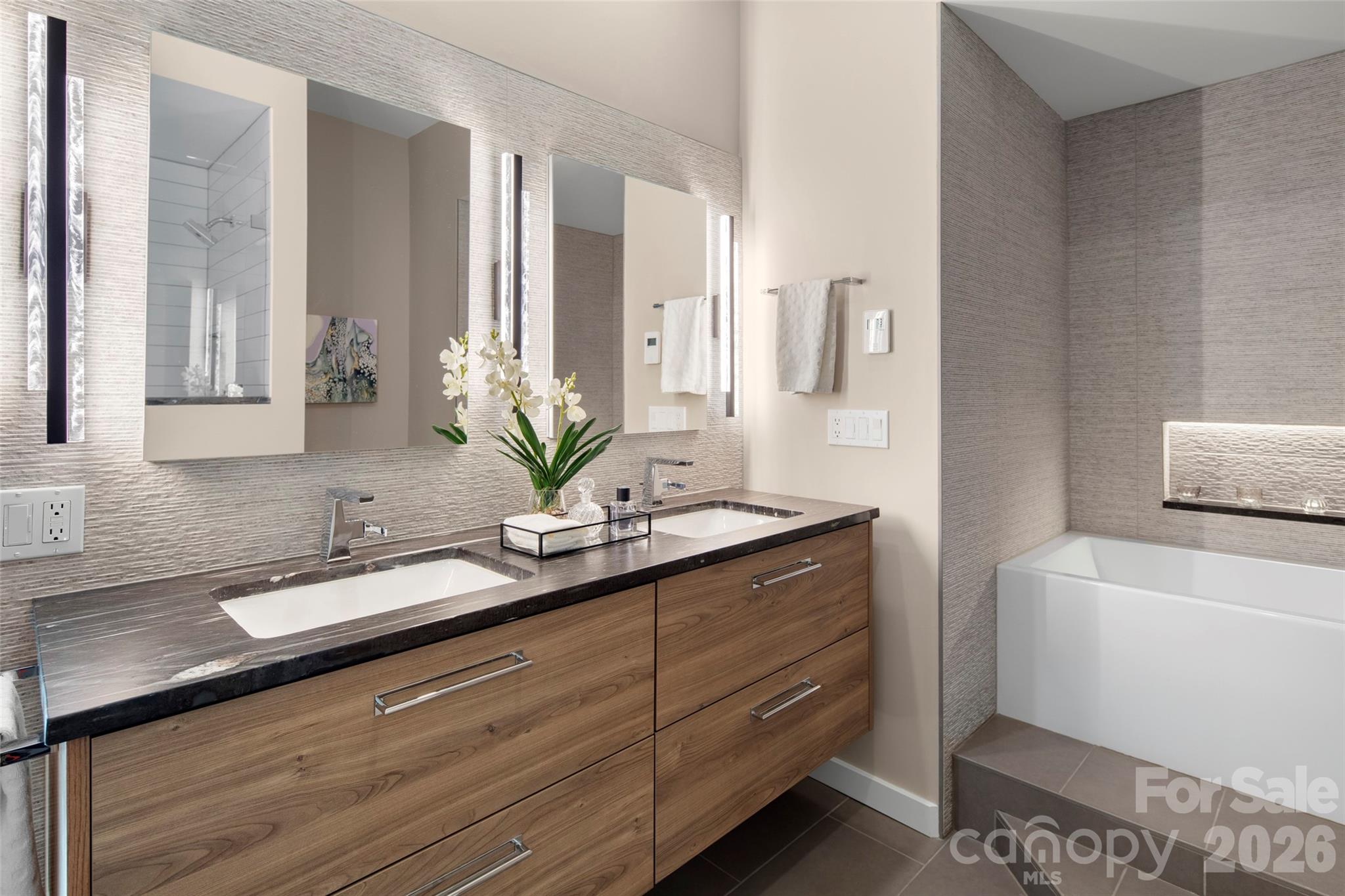 1202 Davis Mountain Road Hendersonville, NC 28739 - Photo 4 of 43 a bathroom with a granite countertop sink and a mirror