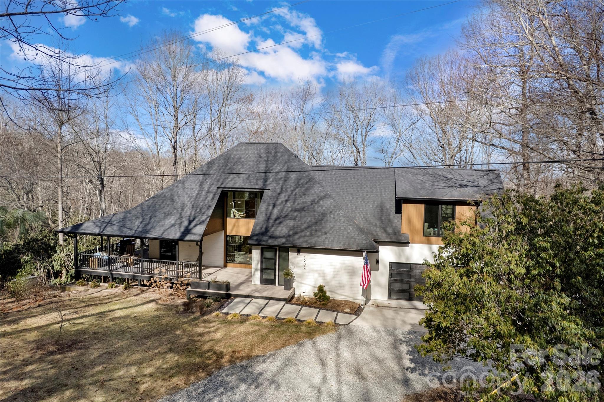 1202 Davis Mountain Road Hendersonville, NC 28739 - Photo 41 of 43 a front view of a house with sitting area
