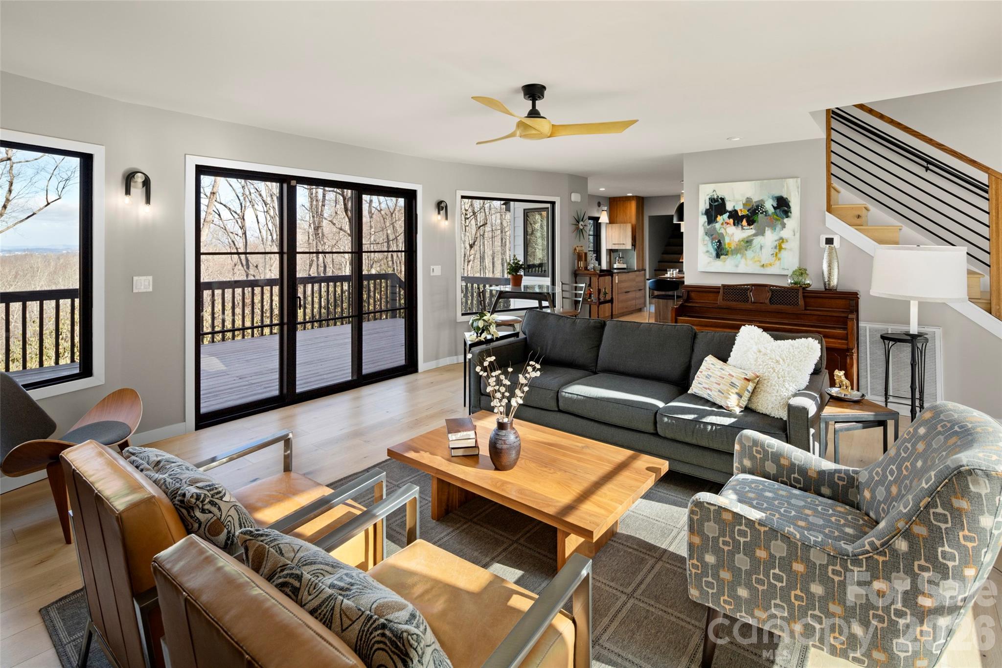 1202 Davis Mountain Road Hendersonville, NC 28739 - Photo 9 of 43 a living room with furniture and wooden floor