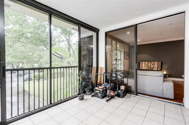 a view of a bathroom with a tub and shower