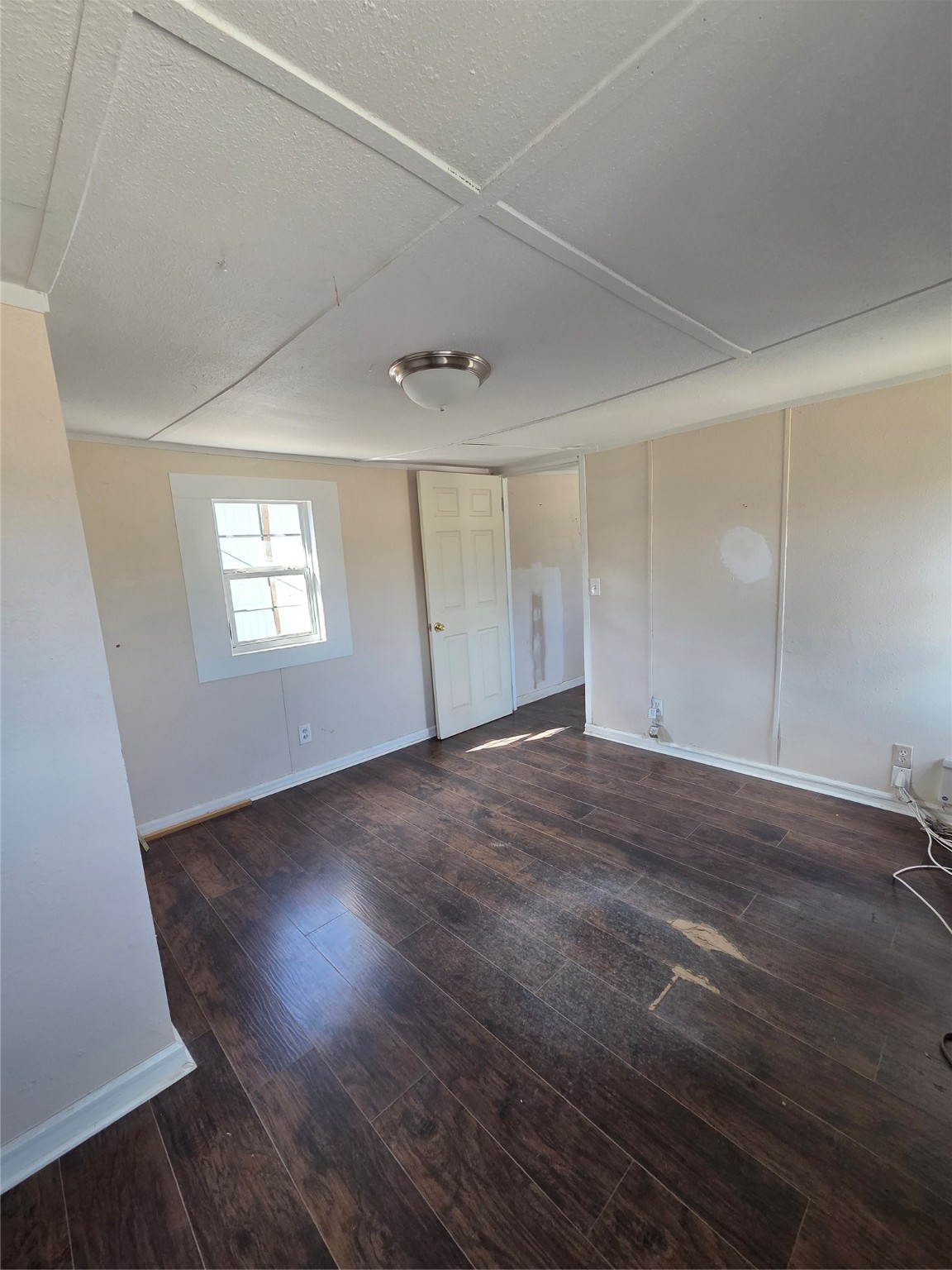 331 West Gulf Bank Road Houston, TX 77037 - Photo 6 of 7 an empty room with wooden floor and windows