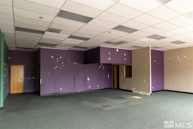a garage with a table and chairs