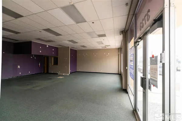 a view of a hall with an empty room