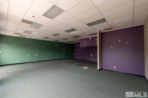 a view of a livingroom with furniture