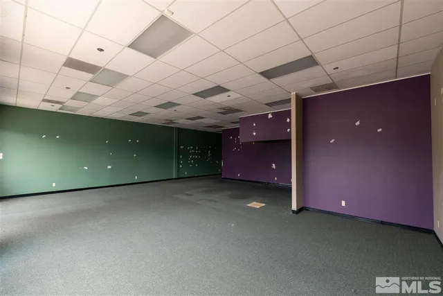 a view of a livingroom with furniture