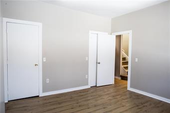 344 Bushkill Street, Unit 2 Easton, PA 18042 - Photo 9 of 30 A well-lit room offers durable flooring and easy access to other living spaces.